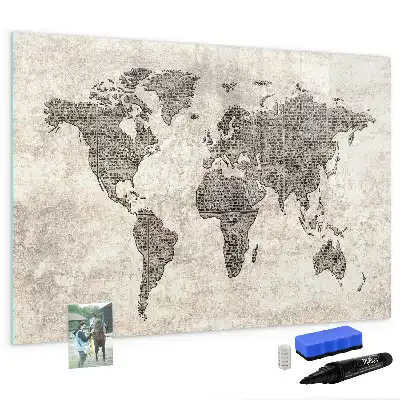 Magnetic marker board featuring a world map made from newspapers