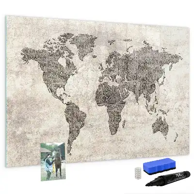 Magnetic marker board featuring a world map made from newspapers