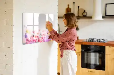 Magnetic glass dry erase board featuring a meadow flowers design