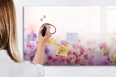 Magnetic glass dry erase board featuring a meadow flowers design