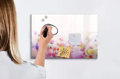 Magnetic glass dry erase board featuring a meadow flowers design