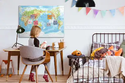 Magnetic glass dry erase board featuring a physical world map