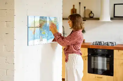 Magnetic glass dry erase board featuring a physical world map
