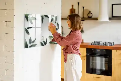 Magnetic glass dry erase board with a frame of leaves design