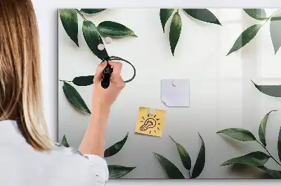 Magnetic glass dry erase board with a frame of leaves design