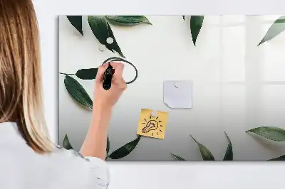 Magnetic glass dry erase board with a frame of leaves design