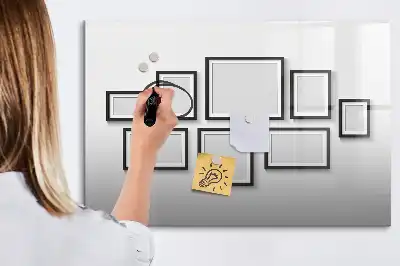 Magnetic marker board with a black frame