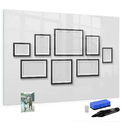Magnetic marker board with a black frame