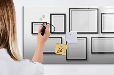 Magnetic marker board with a black frame