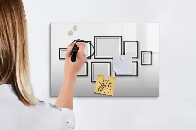 Magnetic marker board with a black frame