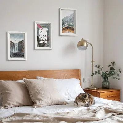 Photo frame wall waterfall, mountain, and nature landscape with boat and vegetation