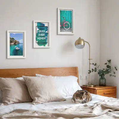 Photo frame wall sea view with a boat, bicycle, and inspirational inscription