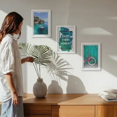 Photo frame wall sea view with a boat, bicycle, and inspirational inscription