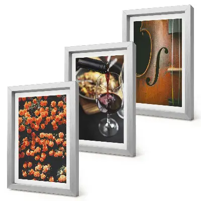 Photo frame wall with a vintage romantic design of flowers, wine, and a violin