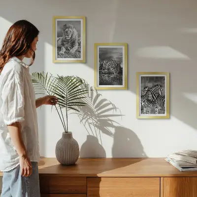 3-piece wall art set featuring a lion, jaguar, and zebra in the savannah