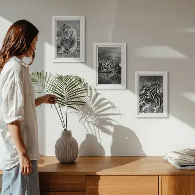 3-piece wall art set featuring a lion, jaguar, and zebra in the savannah