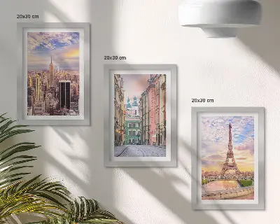 Photo frame wall featuring views of New York, Paris, and Warsaw at dusk