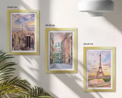 Photo frame wall featuring views of New York, Paris, and Warsaw at dusk