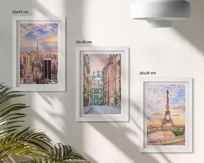 Photo frame wall featuring views of New York, Paris, and Warsaw at dusk