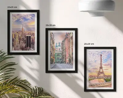 Photo frame wall featuring views of New York, Paris, and Warsaw at dusk