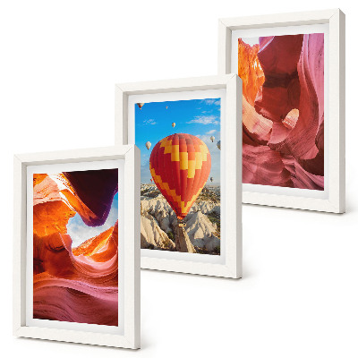 Framed triptych Landscapes of desert gorges and a balloon flight