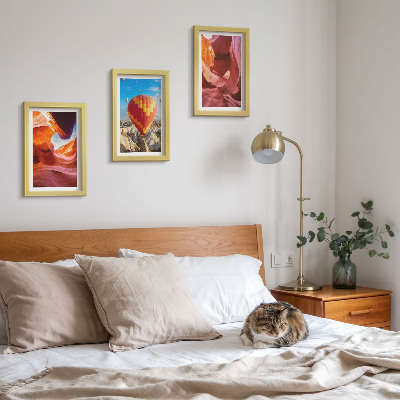 Framed triptych Landscapes of desert gorges and a balloon flight
