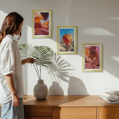 Framed triptych landscapes of desert gorges and a hot air balloon flight