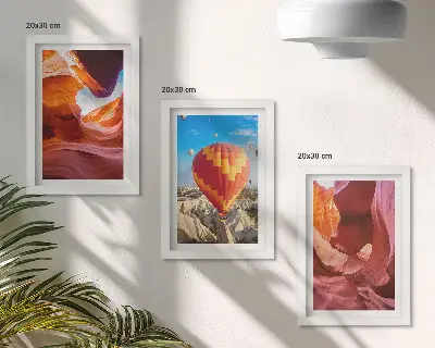Framed triptych landscapes of desert gorges and a hot air balloon flight