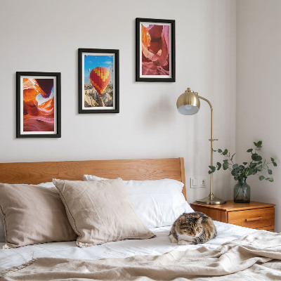 Framed triptych Landscapes of desert gorges and a balloon flight
