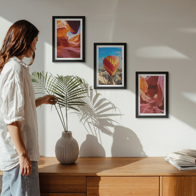 Framed triptych Landscapes of desert gorges and a balloon flight