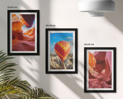 Framed triptych Landscapes of desert gorges and a balloon flight