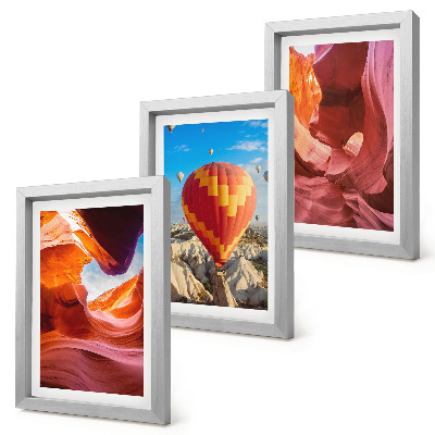 Framed triptych Landscapes of desert gorges and a balloon flight