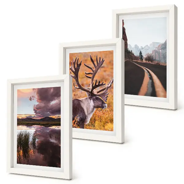 3-Piece Mountain Landscape Wall Art Set featuring reindeer, a winding road, and scenic nature views