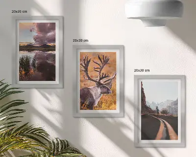 3-Piece Mountain Landscape Wall Art Set featuring reindeer, a winding road, and scenic nature views