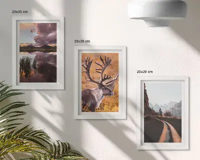 3-Piece Mountain Landscape Wall Art Set featuring reindeer, a winding road, and scenic nature views