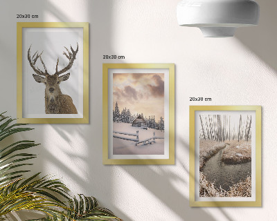 Photo frame wall Winter landscape with a deer hut and a stream