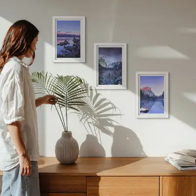 Photo frame wall gallery set with mountain landscapes at dusk and water views