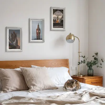 Photo frame wall with views of London featuring the bridge and Big Ben