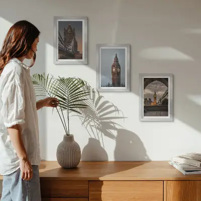 Photo frame wall with views of London featuring the bridge and Big Ben