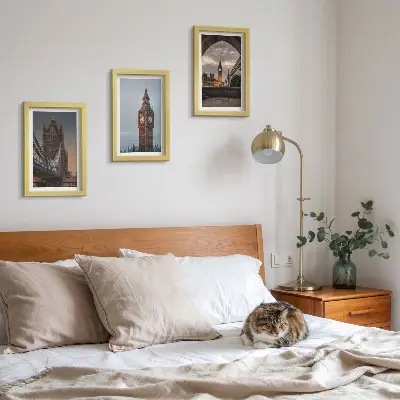 Photo frame wall with views of London featuring the bridge and Big Ben