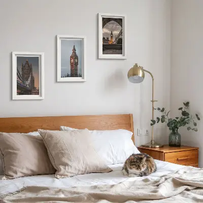 Photo frame wall with views of London featuring the bridge and Big Ben