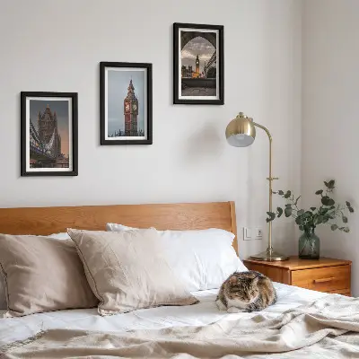 Photo frame wall with views of London featuring the bridge and Big Ben