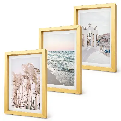 Framed triptych seaside plants and sea waves with a view of white houses