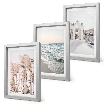 Framed triptych seaside plants and sea waves with a view of white houses