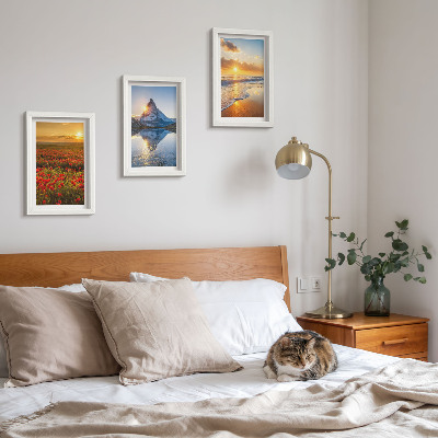 Framed triptych Mountain and seaside landscapes with sunsets