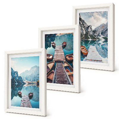 Photo frame wall A calm lake with wooden piers and boats