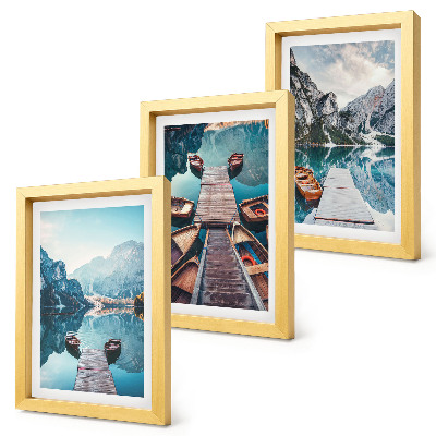 Photo frame wall A calm lake with wooden piers and boats