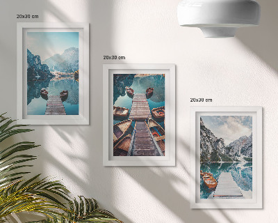 Photo frame wall A calm lake with wooden piers and boats