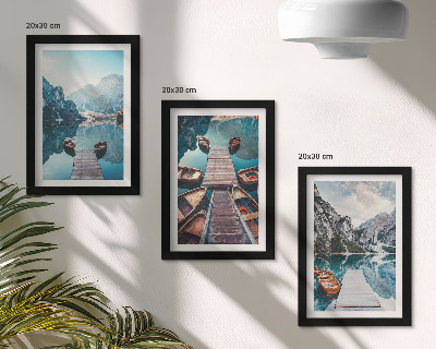 Photo frame wall A calm lake with wooden piers and boats
