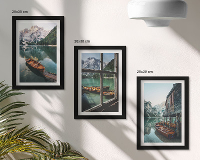 Framed triptych View of a mountain lake with boats and a house by the water